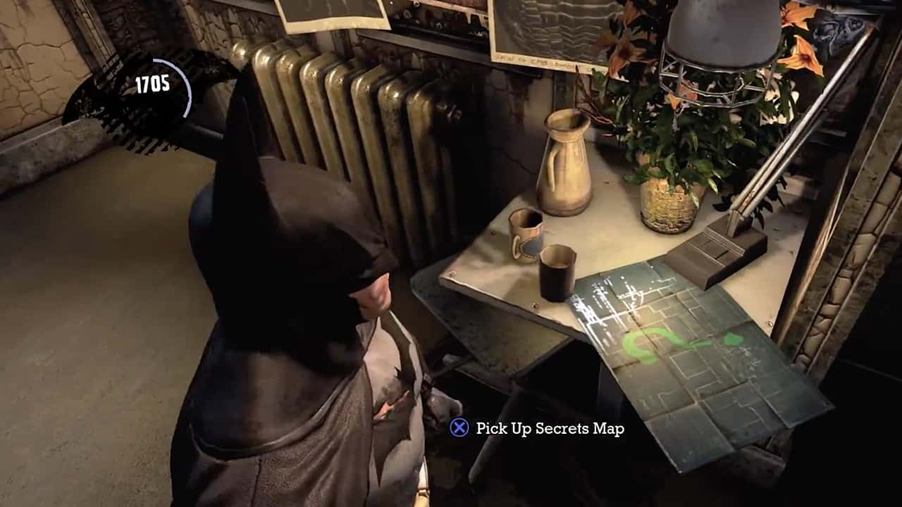 This secrets map is below ground level, so ignore the map location in Arkham Asylum. 