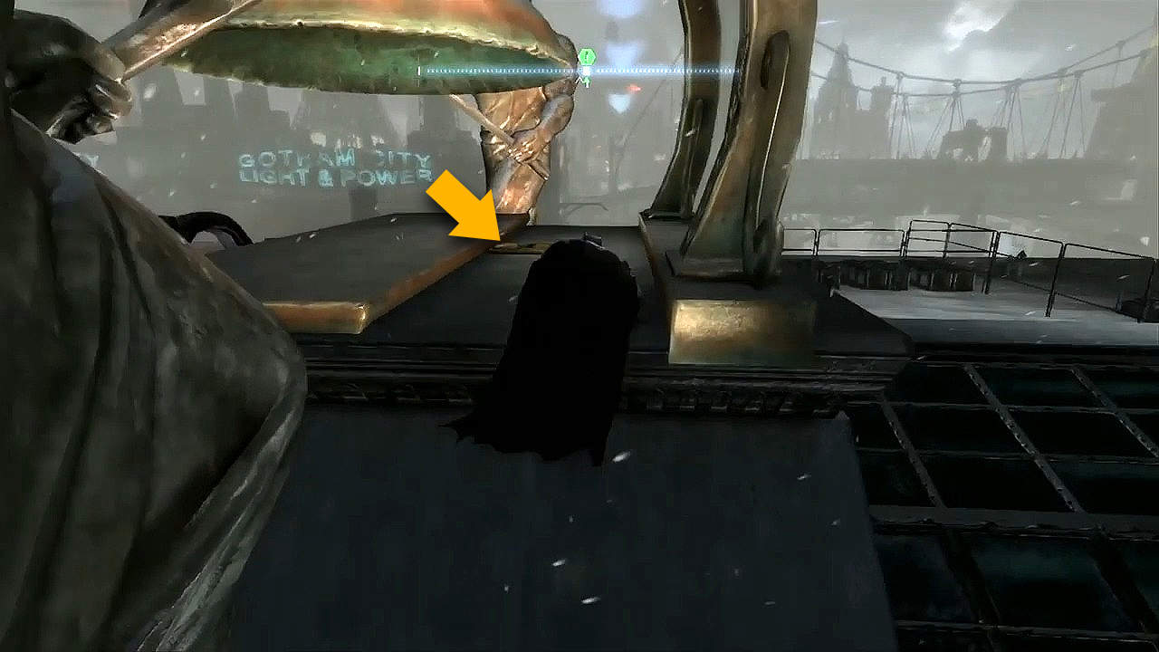 Climb up to the bank's rooftop to find the plaque underneath the bell in Batman: Arkham Origins. 